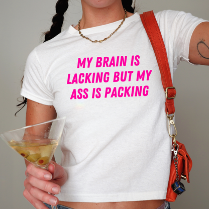 'My Brain Is Lacking But My Ass Is Packing' Baby tee